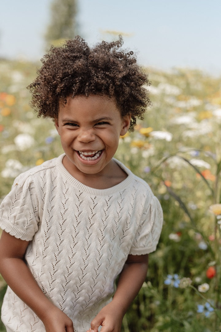 Pull en tricot à manches courtes crème pour bébés et enfants