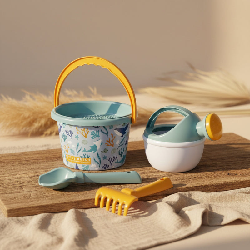 Beach set with bucket, watering can, rake, and shovel for children