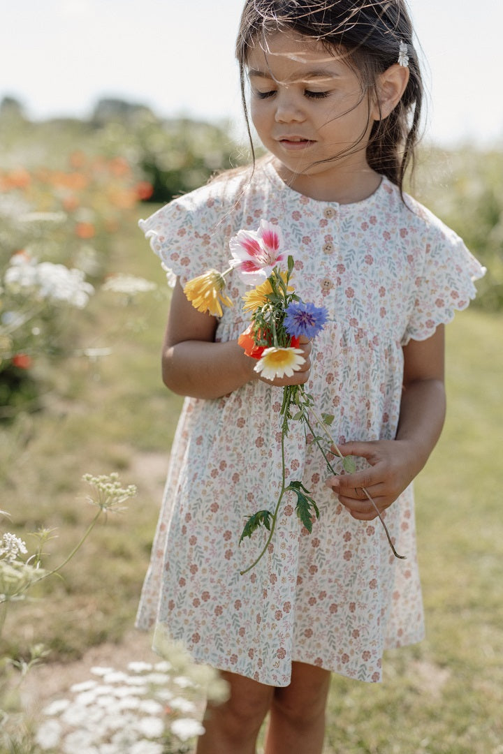 Cream short-sleeved dress for babies and children