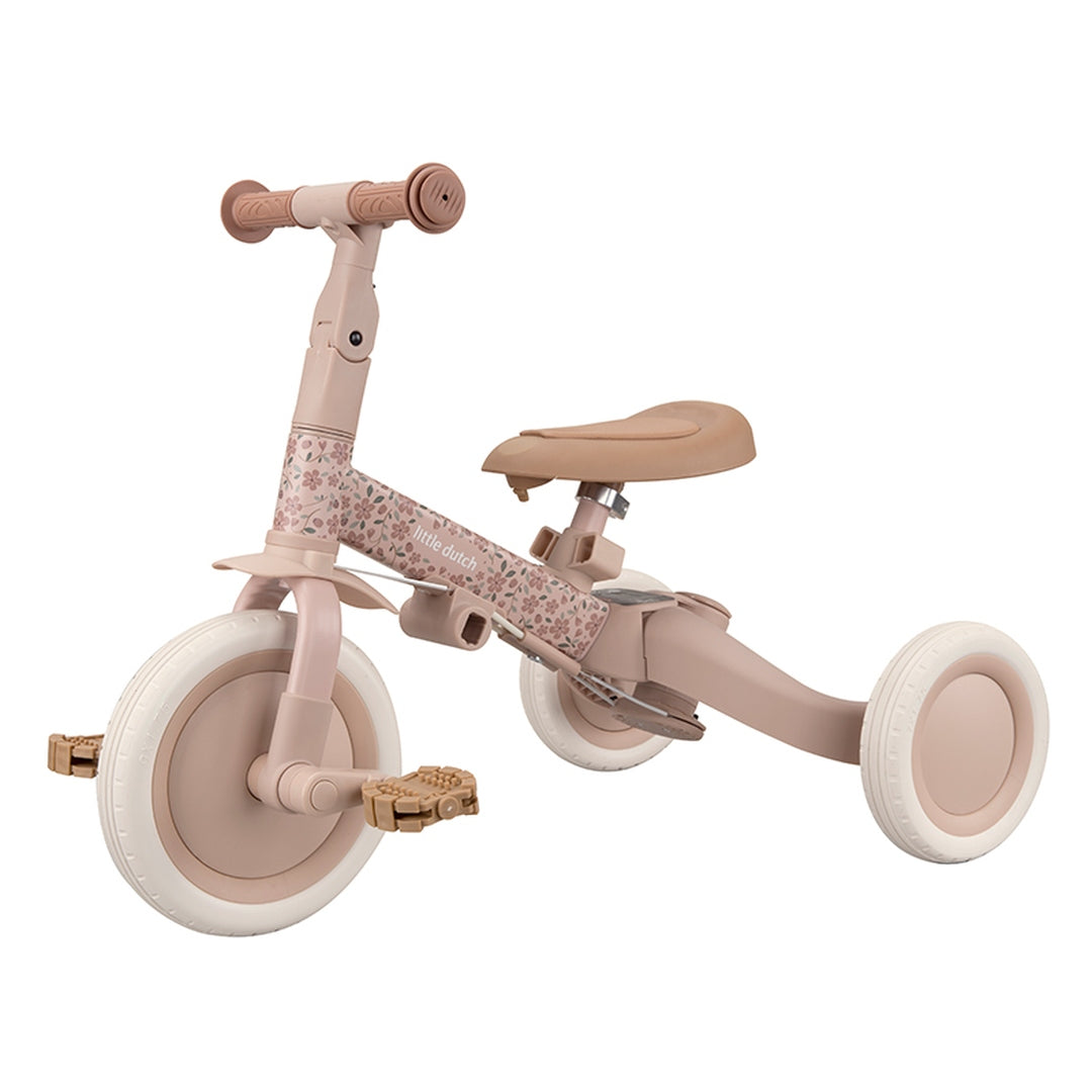 Mitwachsendes 4-in-1 Laufrad Fairy Floral Rosa für Kinder ab 1 Jahr. Hochwertiges Kinderlaufrad mit Pedalen, verstellbarem Sattel und Lenker zur Förderung von Gleichgewicht, Koordination und sicherem Fahrspaß im Kleinkindalter.