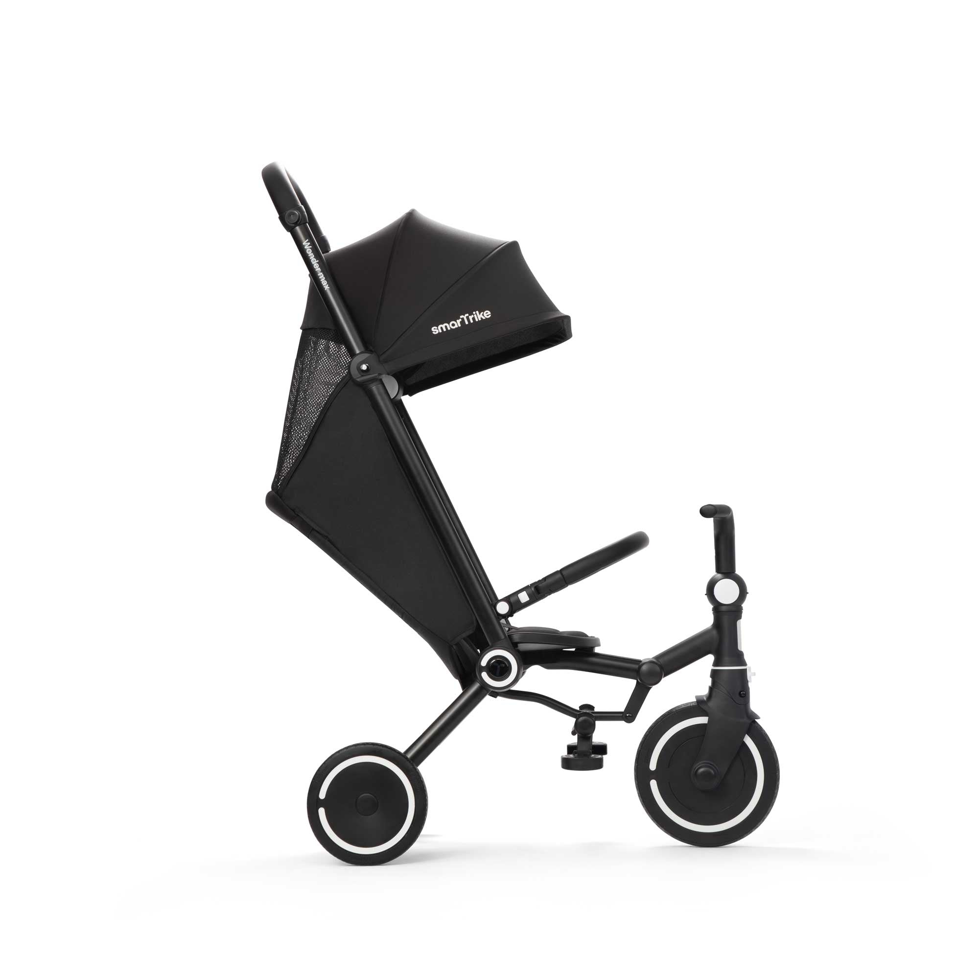 Wonder Max Jet Black kompaktes Reise Dreirad in Seitenansicht leicht faltbar ideal für Urlaub und unterwegs mit Kind
